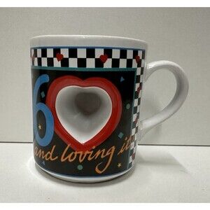 Papel freelance    60 and loving it multicolor coffee mug